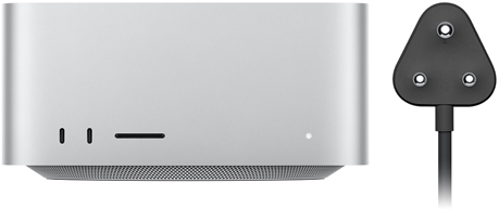 Mac Studio alongside its power cord