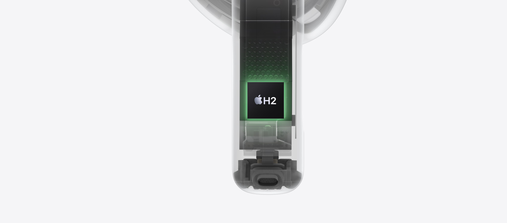 La puce H2 mise en évidence à l’intérieur de la tige d’un AirPods 4.