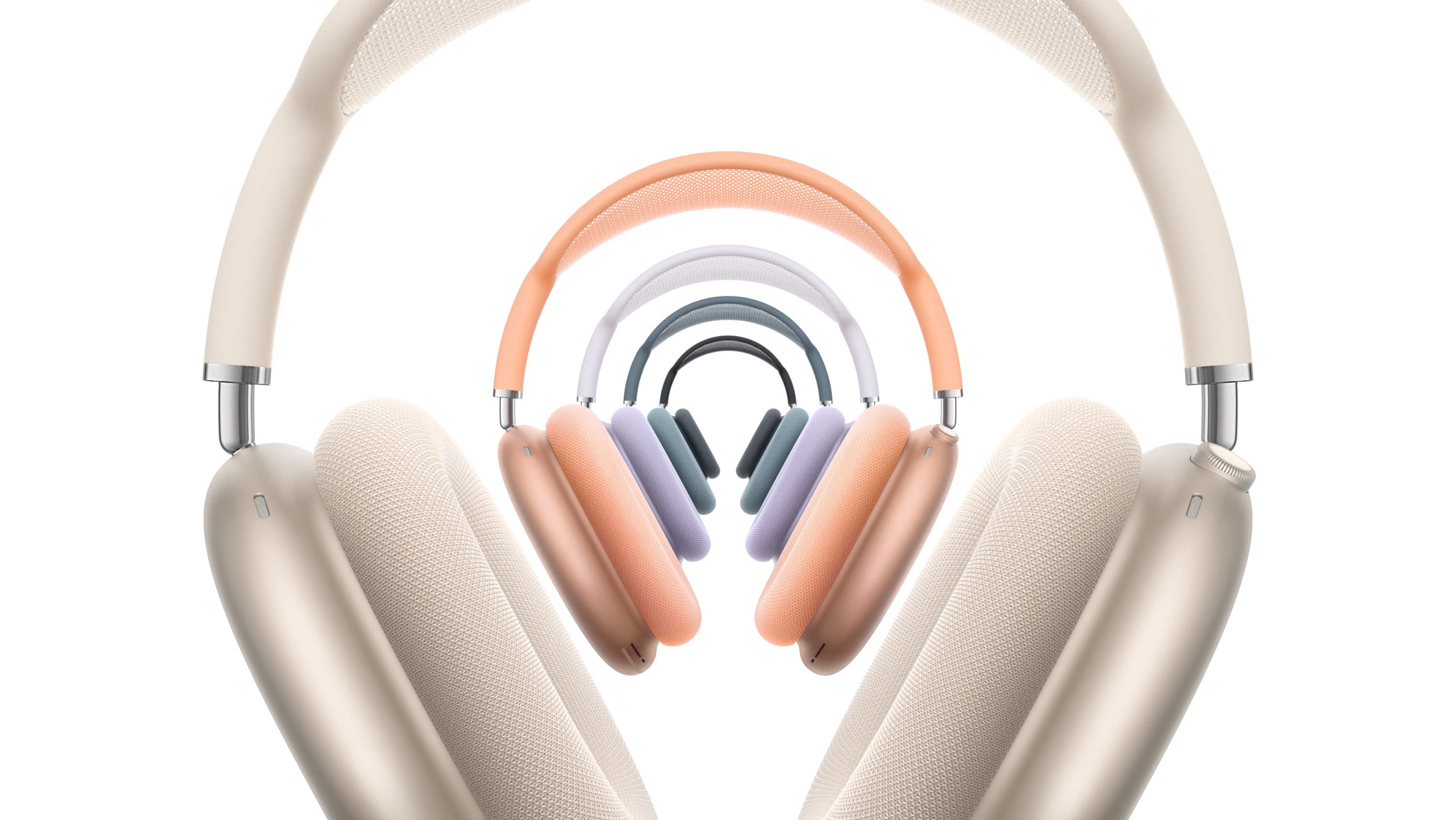 Cinq casques AirPods Max 2, vue avant, superposés, couleur lumière stellaire, orange, mauve, bleu et minuit