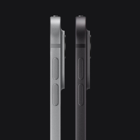 Two iPad Pro devices, side exterior, portrait orientation, silver colour and space black colour, volume-up button, volume-down button, rounded corners, straight edges, raised pro camera system
