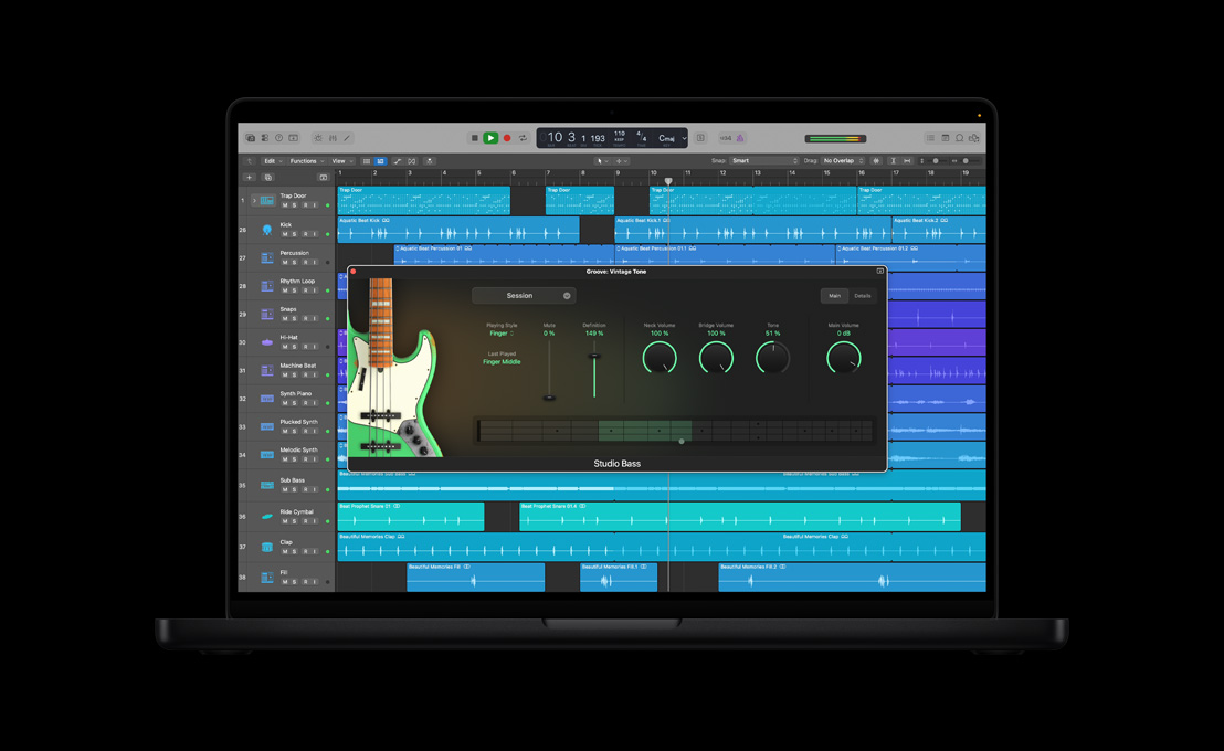 Écran d’un MacBook Pro 16 pouces montrant Basse de studio, fenêtre Groove: Vintage Tone avec guitare électrique verte à gauche, réglages de la séance principale
