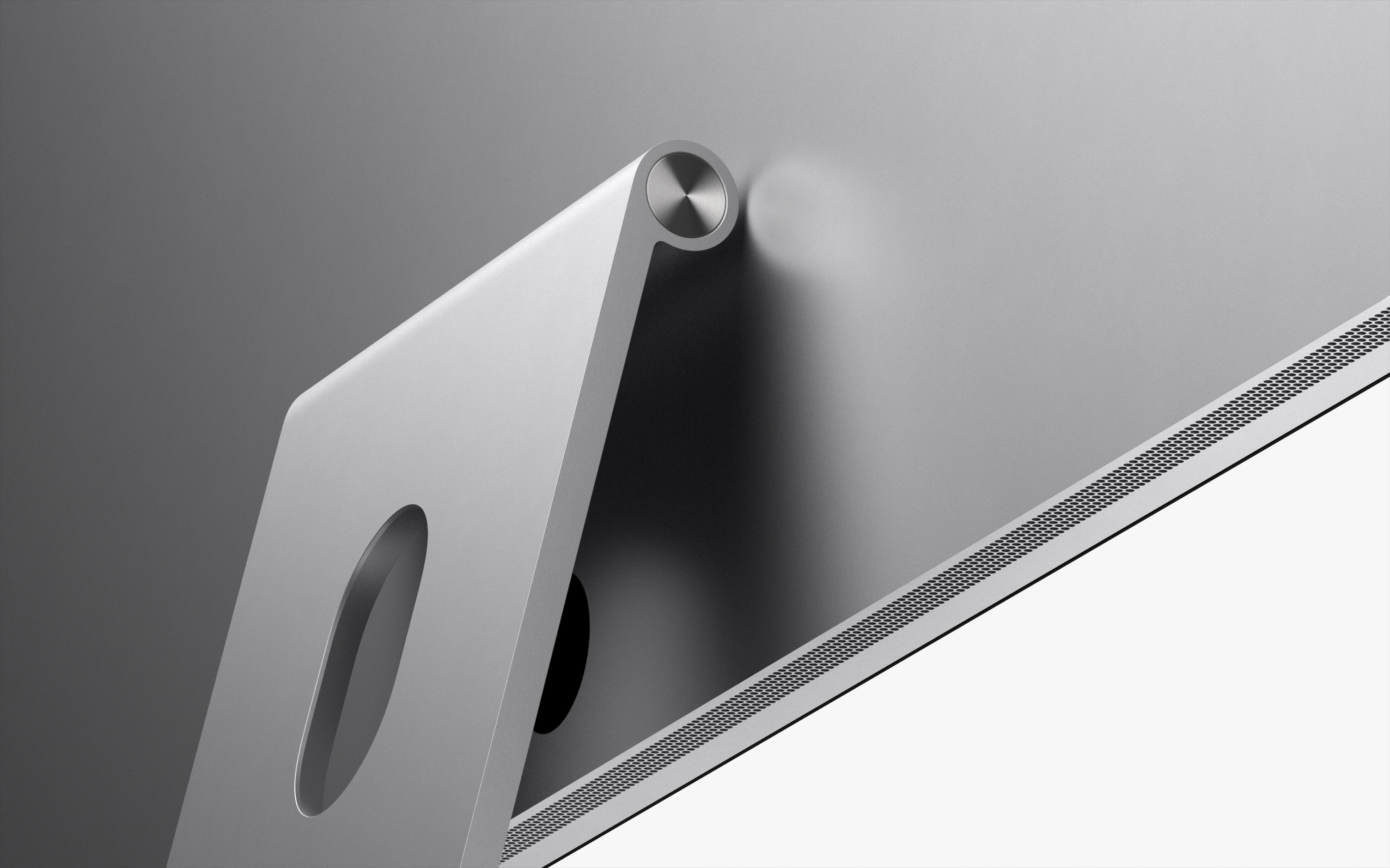 Un Studio Display fixé au support inclinable, vu de dos